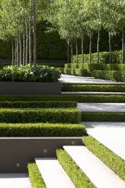 This Multi Sensory Urban Garden In Favara Italy Features A Landscaped Terrace With Plants Seatin Modern Landscaping Formal Garden Design Garden Architecture