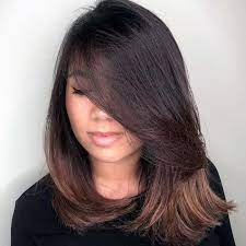 Medium length with arched bangs. 38 Medium Length Hairstyles And Haircuts For 2021