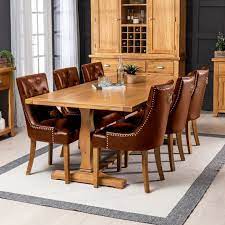 Find the best leather dining chairs for your home in 2021 with the carefully curated selection available to shop at houzz. Solid Oak Refectory 2m Dining Table And 6 Brown Faux Leather Chairs The Furniture Market