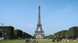 8 Free Zoom Backgrounds For The Travel Lover Saba Bok Eiffel Tower On A Sunny Day Travel Lover Portland Travel Guide Portland Travel