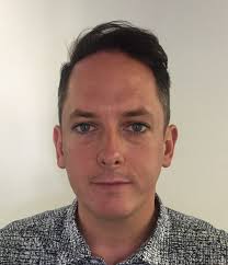 Britain's Ed Egan works with Mike Darnell and Mark Burnett