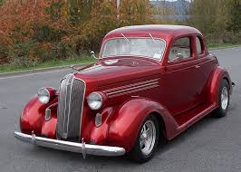 Image result for Mansion Maroon 1938 Oldsmobile