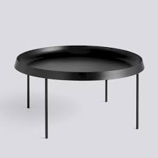 The frame features roman numerals. Tulou Coffee Table Hay