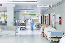 Doctor Hospital Corridor Blurred Lift Red Bed Corridor In Hospital With Blurred Ad Blurred Lift Corridor Doc Veterans Benefits Red Bedding Hospital