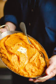 This Is What Ina Garten Is Making For Thanksgiving This Year Smashed Sweet Potatoes Thanksgiving Menu Recipes Recipes