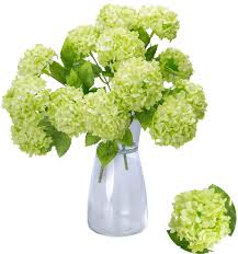 It's perfect for specimen plantings, mixed borders, and mass plantings. Amazon Com Greentime Tiny Artificial 7 Heads Hydrangea Bouquet Faux 13 Inches Mini Silk Hydrangea Flowers For Wedding Home Table Centerpiece Party Decoration Green Home Kitchen