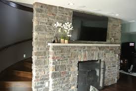 Rion rizzo, creative sources photography elegant porch photo in charleston with a fire pit white frame, fireplace, white railings. J N Stone Inc Stone Fireplace Fireplace Stone