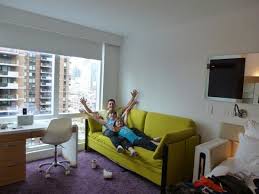 If you need the lower bunk only for sleepover guests, a few big cushions will help turn it into a cosy sofa. Our Family Room With Double Bed And Sofa That Converts To Bunk Beds Picture Of Yotel New York New York City Tripadvisor