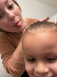 Husband's first attempt at braiding his daughter's hair