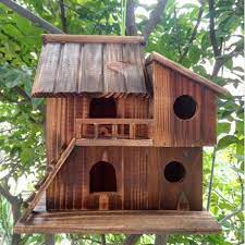 Now, nail your two roof pieces together with the shorter piece on the side of the longer piece. Type Birds Material Wood This Wood Decorative House Will Give Your Birds Some Interest To Play In Or Even Live Wooden Bird Houses Bird House Bird House Kits