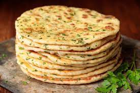 Take the baking sheet out, sprinkle with some corn meal then put the dough on it. Greek Yogurt Turkish Flatbread Bazlama The Cafe Sucre Farine