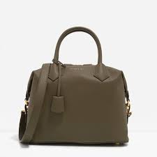 Within a year, the pasting of the handle started coming out. Soft Bowling Bag Charles Keith Bags Bowling Bags Top Handle Bag