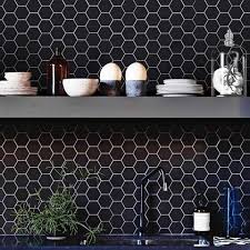 The hexagon pattern is playful and yet still subdued enough to be appealing to all of their guests, no matter their. Black Kitchen Backsplash With Winckelmans Hex Tile Contemporary Kitchen New York By Herbeau Winckelmans Tiles Line Art Vanities Houzz