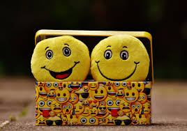 Two Yellow Emoji on Yellow Case · Free Stock Photo
