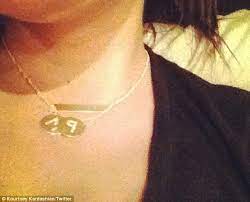 I Wasn T Prepared For How Much I Love Her Kourtney Kardashian Introduces Daughter Penelope To The World Initial Pendant Necklace Gold Disc Initial Necklace Necklace