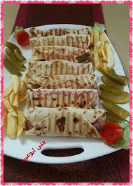 طريقة عمل الشاورما بخبز التورتيلا بالصور زاكي Lebanese Recipes Recipes Food