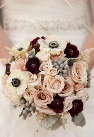 Winter Bouquet Of Quicksand Roses Ranunculus Majolica Spray Roses Astilbe Baby S Br Burgundy And Blush Wedding Winter Wedding Bouquet Blush Bouquet Wedding