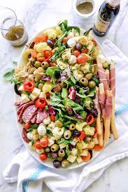 If you enjoy having friends over for a wine and cheese pairings, this type of platter is perfect for that event. How To Make An Awesome Antipasto Salad Platter Foodiecrush Con