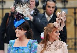 With today dubbed as ladies day the hat, dark purple in colour, featured a top that was low in height and was covered with white flowers. Royal Wedding Hats Is That An Octopus On Your Head The Star