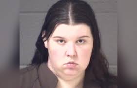 Woman arrested in Asheville shooting