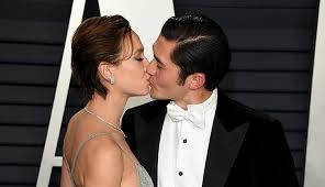 The crazy rich asians star posted a photo of he and his wife, who was sporting a baby bump. Henry Golding Liv Lo S Sweet Relationship Timeline Purewow