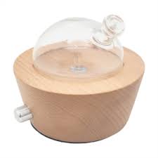 Le diffuseur d'huiles essentielles intègre une pompe à air silencieuse dans son socle en bois. Diffuseurs Huiles Essentielles Florame