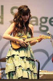 zooey deschanel celebrities actress model bangs hairstyle makeup lipstick fashion new girl tv show silly cute music zooey deschanel ukulele style