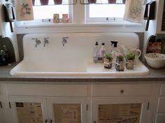 Partitioned black kitchen sink & faucet. 76 Antique Retro Kitchen Faucets And Sinks Ideas For New Vintage Kitchen Design Style Kitchen Design Styles Vintage Kitchen Retro Kitchen