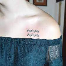 52 Unique And Gorgeous Aquarius Tattoos With Meanings In 2020 Aquarius Tattoo Zodiac Sign Tattoos Aquarius Symbol Tattoo