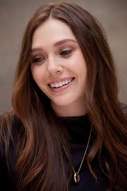 Actors elizabeth olsen (l) and bryan cranston attend the premiere of warner bros. May 4 Godzilla Press Conference 046 Elizabeth Olsen Source Photo Archive