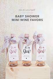 Oversize diaper pin party decorations • baby shower idea: These Diy Baby Shower Mini Wine Favors Are Just Too Cute