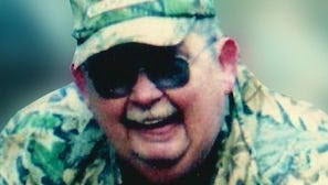 Ernest Michael "Mike" Poynter