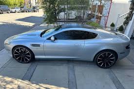 Image result for Lightning Silver 2008 Aston Martin