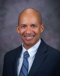 Eric Higgins, a professor in the College of Business, isn't just shaping  the next generation of finance professionals—he's raising them. From  running the von Waaden Student Investment Portfolio with his students to