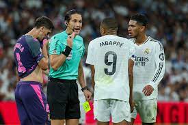 La 'amenaza' de Munuera Montero a Mbappé y el exabrupto de Bellingham: de  "Te la estás jugando" a "Vaya m..." | Marca
