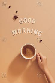 Find the perfect morning coffee cup stock photos and editorial news pictures from getty images. Hand Holding Cup Of Coffee Under Good Morning Sign Stock Photo Offset