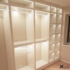 Wonderful Absolutely Free Led Lighting In Wardrobe Clothes Rack And Shelves Is Illuminated With Led Tape Fr Closet Renovation Dream Closet Design Closet Decor