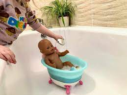 The small one reviewing and playing with the baby born interactive bathtub. Baby Born Bathtub Review Bath Time Fun Rachel Bustin