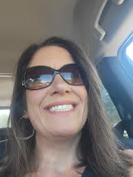 Can you edit my photo to look happier?