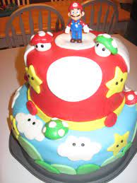 Simple cake, highlighted with the colors of mario, along with topper of the video game hero. Mario Cakes Decoration Ideas Little Birthday Cakes