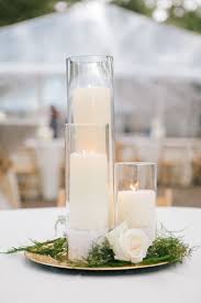 White Candle Wedding Reception Centerpiece Modwedding Wedding Reception Candles Wedding Reception Centerpieces Candles Wedding Floral Centerpieces