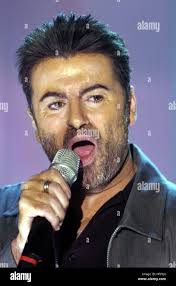 dpa) British singer George Michael performs during the German TV show  "Wetten dass.?" (bet that.?), in Basel, Switzerland