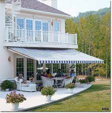 Decks With Awnings Retractable Awnings Add Space Without The Costly Addition Outdoor Awnings Backyard Patio Deck Awnings