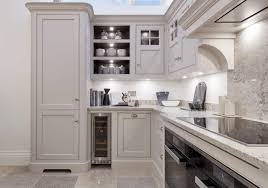 The uniform use of the lightly stained wood on the cabinets, floors and. Small Kitchen Design Ideas Intelligent Storage Solutions