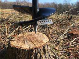 The bit should be long enough to make holes 8 to 10 inches deep and specifically made for wood boring. Stump Planer Auger Premier Attachments