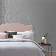 We have collated a fantastic range of feature wall bedroom wallpaper designs that graphite, black & grey printed modern motif wallpaper this wallpaper design is in a graphite, black & grey colour scheme. Inspirational Living Room Ideas Living Room Design Grey Textured Wallpaper Living Room