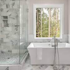 The wall color, the exposed wood beams, the granite tiles, the dark wooden cabinets, and of course the traditional rugs lengthening the space. 25 Amazing Dream Bathrooms