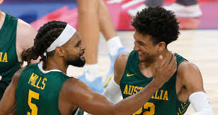 Australia's patty mills, left, and matthew dellavedova (8) celebrate a score against argentina. What We Learned From The Boomers First Game Ahead Of The Olympics
