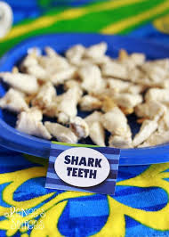 These super cute party shark marshmallow pops are easy to make and would be the highlight as an under the sea party food. Kara S Party Ideas Shark Party Ideas Planning Idea Supplies Decorations Sea