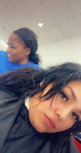 Who is a good hair stylist for post-traumatic hair stress?